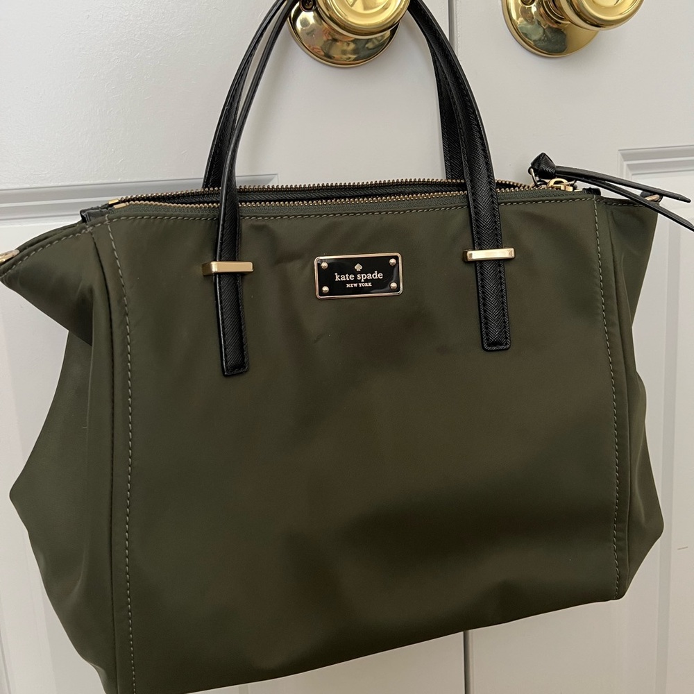 Kate Spade dark olive green nylon bag with black leather handles.